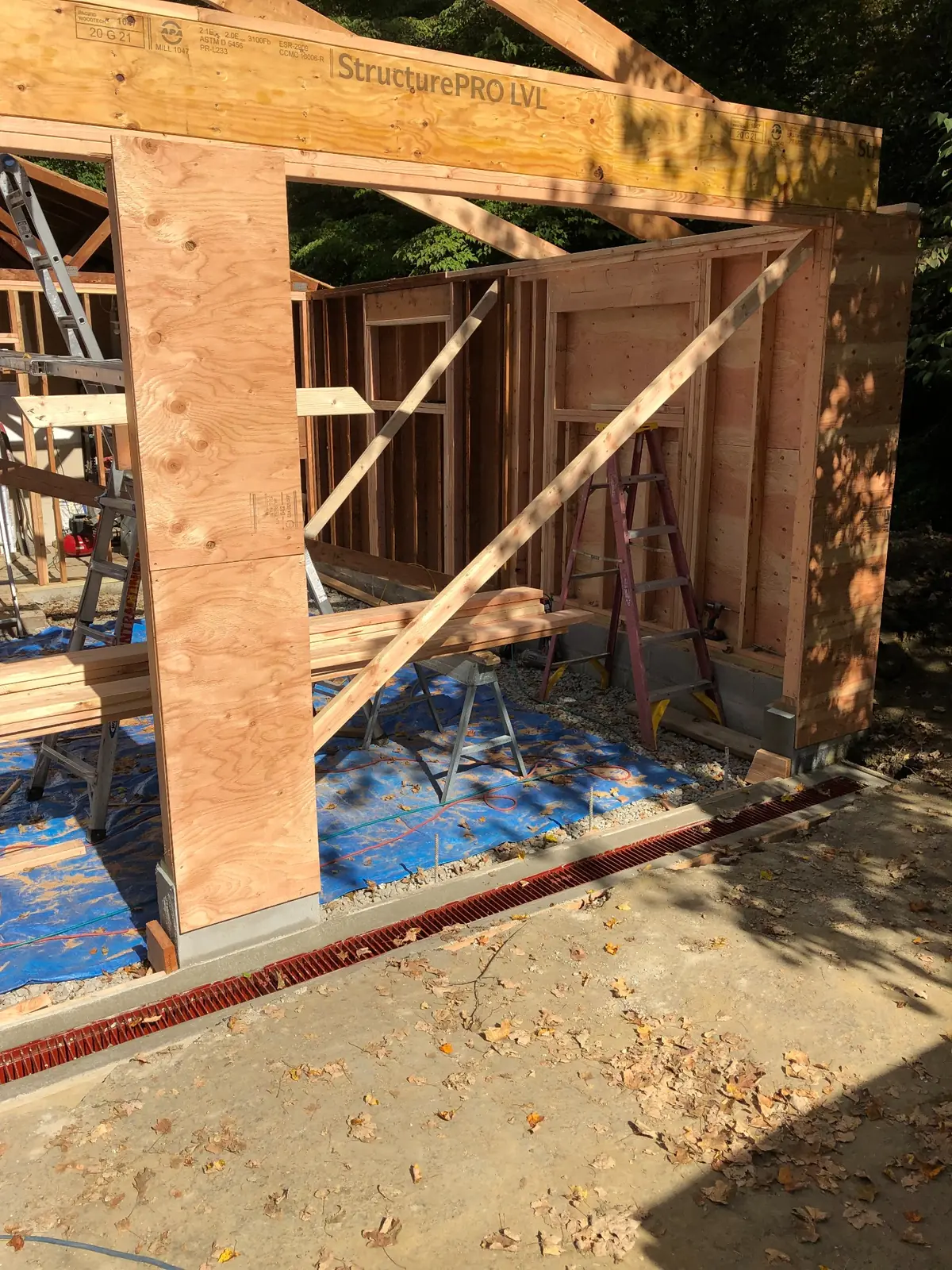 Detailed wall and beam framing during construction of a home addition